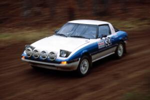 Waheed Khan / Deb Boudreau at speed on the first stage in their Mazda RX-7.