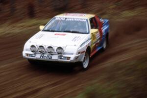 Tim Maskus / Doug Trott at speed through the SS1 spectator location in their Mitsubishi Starion.