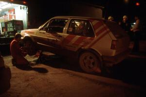 W.G. Giles / Bob Pierce make repairs to their VW GTI at the second L'Anse service.