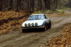 The Waheed Khan / Deb Boudreau Mazda RX-7 at speed on the first stage of day two.