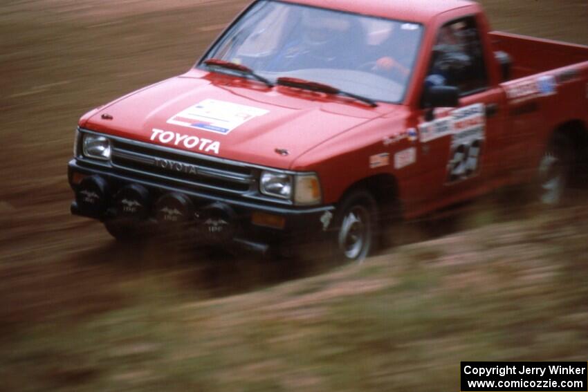 Gary Gooch / Judi Gooch blast past the spectator point on SS1 in their Toyota Pickup.