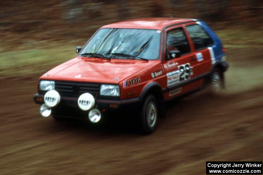 Al Kaumeheiwa / Doug Henry at speed at the spectator corner on SS1 in their VW GTI.