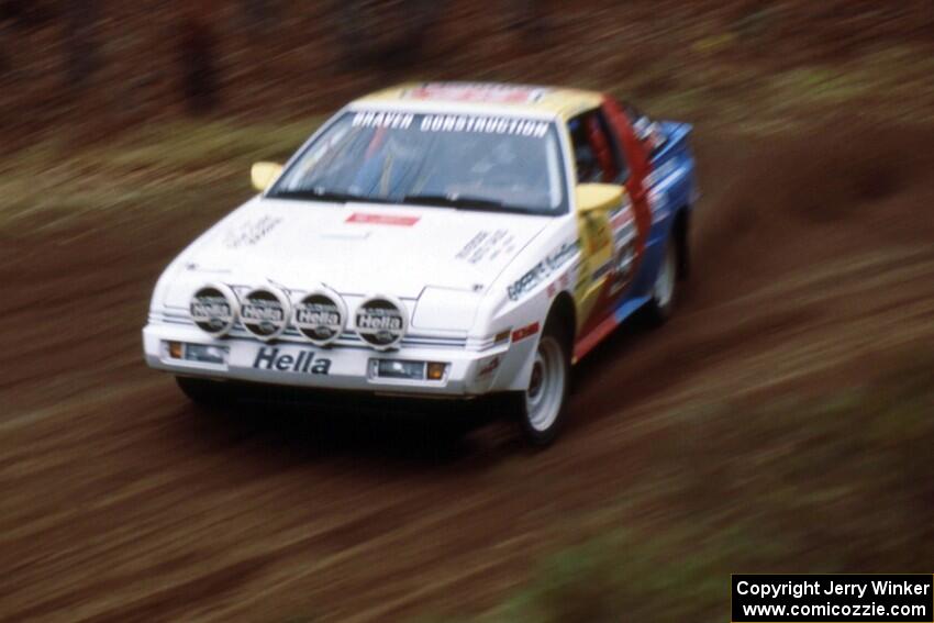 Tim Maskus / Doug Trott at speed through the SS1 spectator location in their Mitsubishi Starion.