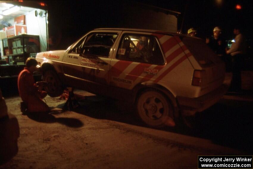 W.G. Giles / Bob Pierce make repairs to their VW GTI at the second L'Anse service.