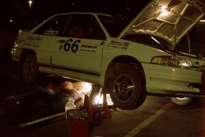 Tad Ohtake / Bob Martin get their Ford Escort GT serviced in Mahnomen on day one.