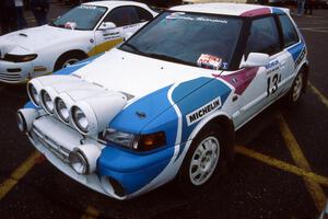 The Peter Moodie / Mike Fennell Mazda 323GTR at parc expose on day two.