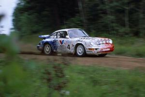 The Jeff Zwart / Martin Headland Porsche Carrera 4 at speed.