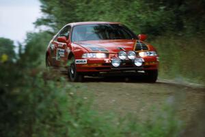 Walt Petersen / Harry Pressey set their Honda Prelude up for the s-curve at the spectator point at the county road.