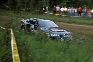 Jim Anderson / Matt Chester carry too much speed off the long straight in their Honda Prelude and go into a ditch.