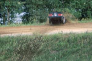 The Ed Mucklow / Bob Campbell Toyota Celica leaped and cleared the county road. They did continue with two flats!