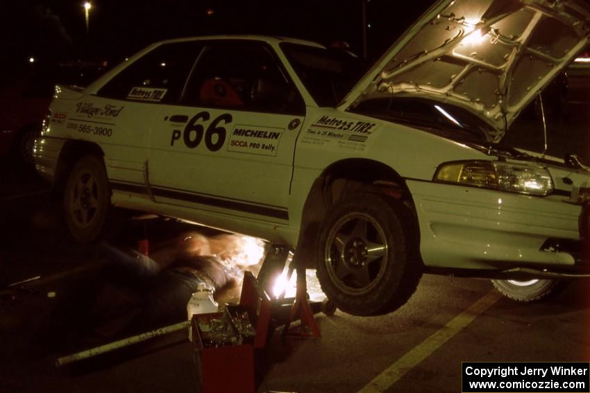 Tad Ohtake / Bob Martin get their Ford Escort GT serviced in Mahnomen on day one.