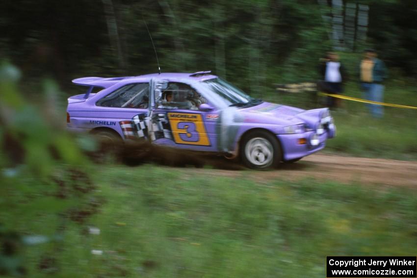 Car tree, the Carl Merrill / John Bellefleur Ford Escort Cosworth through a sweeper at the spectator location at the county road