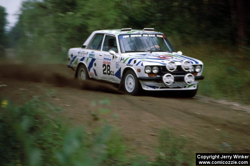 The Mike Whitman / Kevin Linville Datsun 510 drifts into the spectator corner at the county road.