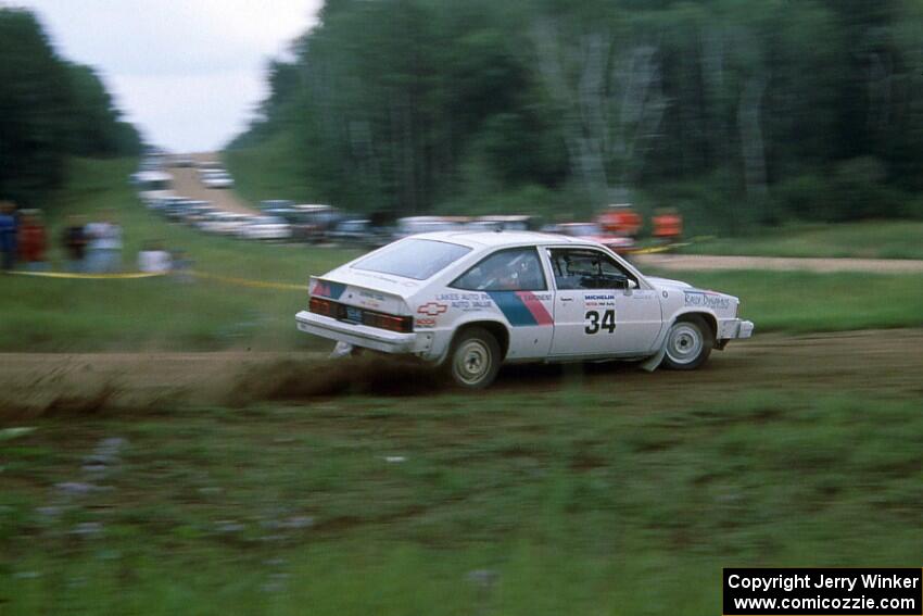 Gail Truess / Cindy Krolikowski fling their Chevy Citation past the crowd at the conty road spectator location.