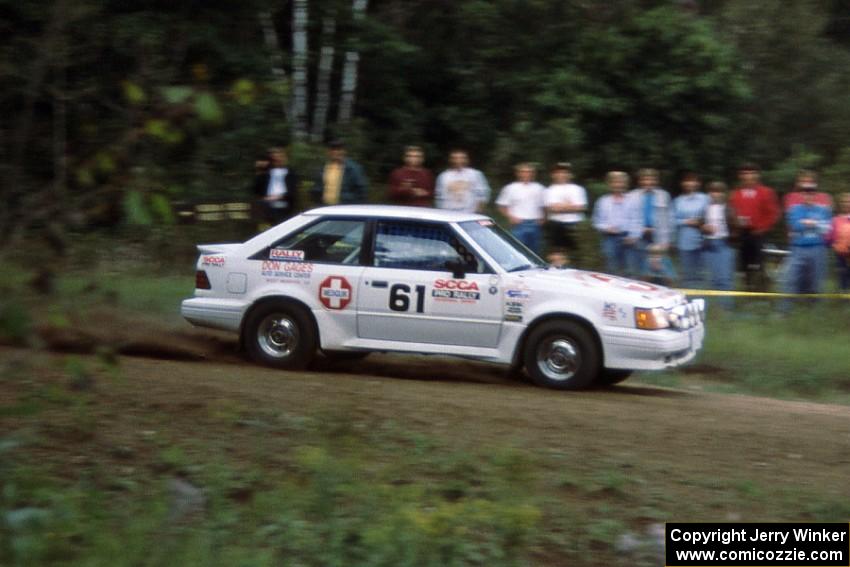 Doc Shrader / Don Gage in their Ford Escort GT at the county road spectator point.