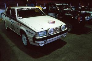 Robert Parks / Jerry Tobin Alfa Romeo Milano alongside the Jeff Hendicks / Noble Jones Jeep Comanche at Dee Stadium.
