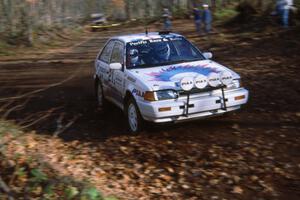 Greg Lund / Lynne Lund finish SS1, Beacon Hill, in their Mazda 323GTX.