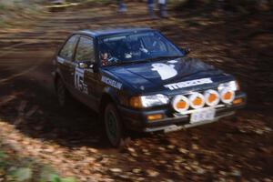 Tom Ottey / Pam McGarvey in their Mazda 323GTX at the finish of SS1.