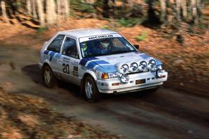 The Mitch McCullough / Scott Webb Mazda 323GTX near the finish of SS1.