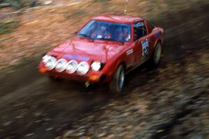 Carl Redner / Nancy Redner in their Mazda RX-7 come into the finish of SS1.