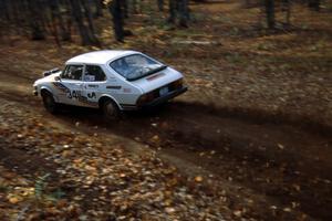The Jerry Sweet / Stuart Spark SAAB 99 flings leaves at the finish of SS1.