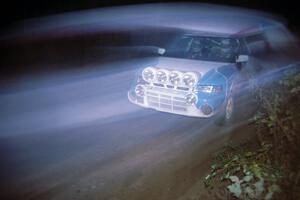 Peter Moodie / Michael Fennell in their Mazda 323GTR are a blur near the finish of the Menge Creek stage.