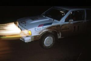 Gail Truess / Cindy Krolikowski in their Chevy Citation press on during the first nights stages.