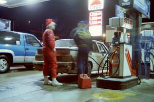 Robert Parks / Jerry Tobin in their Alfa Romeo Milano refuel at the Citgo in Houghton(1).