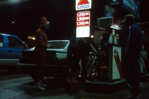 Robert Parks / Jerry Tobin in their Alfa Romeo Milano refuel at the Citgo in Houghton(2).