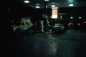 Scott  Justus / Yorgi Bittner Chevy S-10 Blazer and an unidentified Misubishi Eclipse refuel at the Citgo in Houghton.