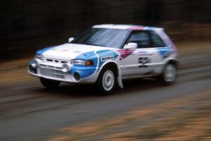 Peter Moodie / Michael Fennell Mazda 323GTR leaves the start of Delaware 1 stage.