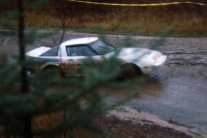Bryan Pepp / John McArthur bring the tail out on their Mazda RX-7 at the exit of the Delaware delta.