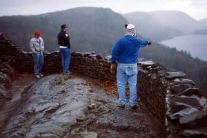 L to R) John Anderson, Al Taylor, and Randy Jokela enjoy a view of the Porcupine Mts. the Sunday morning after the rally.