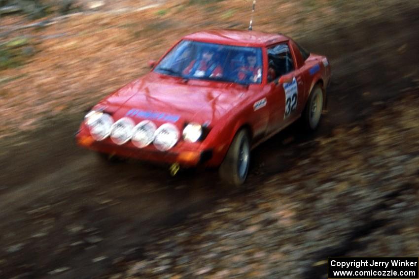 Carl Redner / Nancy Redner in their Mazda RX-7 come into the finish of SS1.