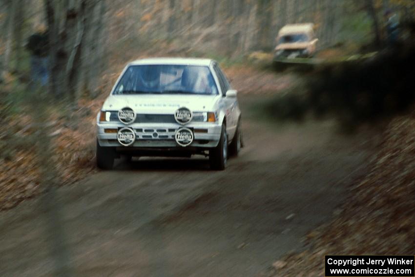 The Larry Schmidt / Joe Andreini Mazda 323GTX at the end of SS1.
