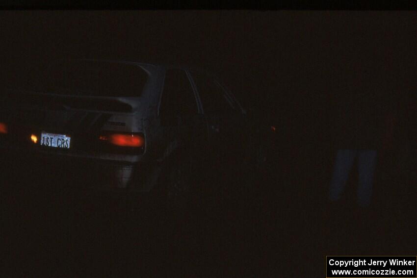 Mitch McCullough / Scott Webb Mazda 323GTX prepares to leave L'Anse service.