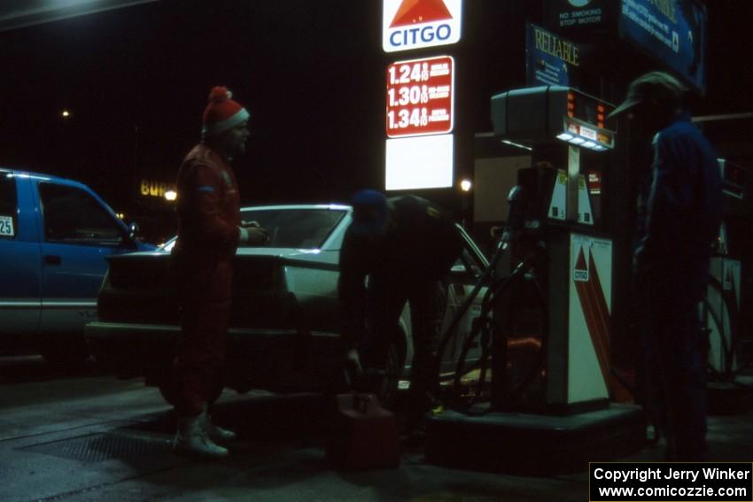 Robert Parks / Jerry Tobin in their Alfa Romeo Milano refuel at the Citgo in Houghton(2).