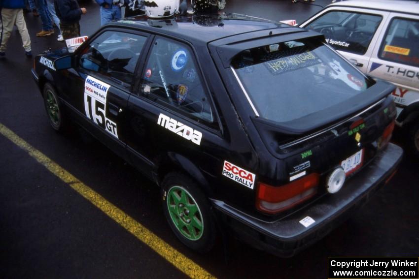 Tom Ottey / Pam McGarvey in their Mazda 323GTX at Saturday morning parc expose in Calumet.