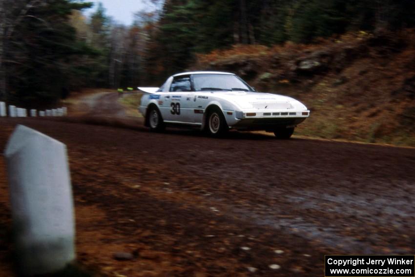 Bryan Pepp / John McArthur bring the tail out on their Mazda RX-7 near the start of Delaware stage.