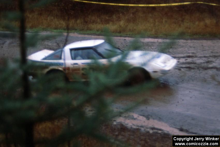 Bryan Pepp / John McArthur bring the tail out on their Mazda RX-7 at the exit of the Delaware delta.