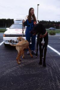 Amity Trowbridge walks her dogs in front of the Toyota Celica All-trac she and Janice Damitio shared.