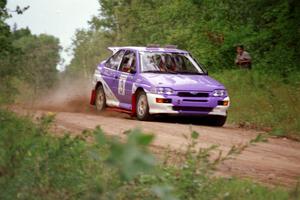 Carl Merrill / John Bellefleur flog their Ford Escort Cosworth over a rise on Indian Creek Trail Rd.