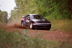 Cal Landau / Eric Marcus in their Mitsubishi Eclipse GSX throw gravel on Indian Creek Trail Rd.