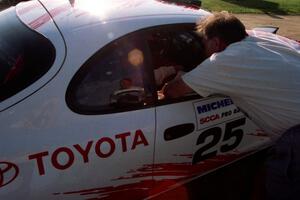 Dave Fuss chats with Jeff Panton / Rudy Meikle in their Toyota Celica GT-4 before they leave Park Rapids service.