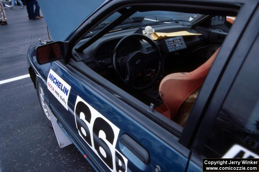 The Tad Ohtake / Bob Martin Ford Escort GT at parc expose with their unique dash ornament.