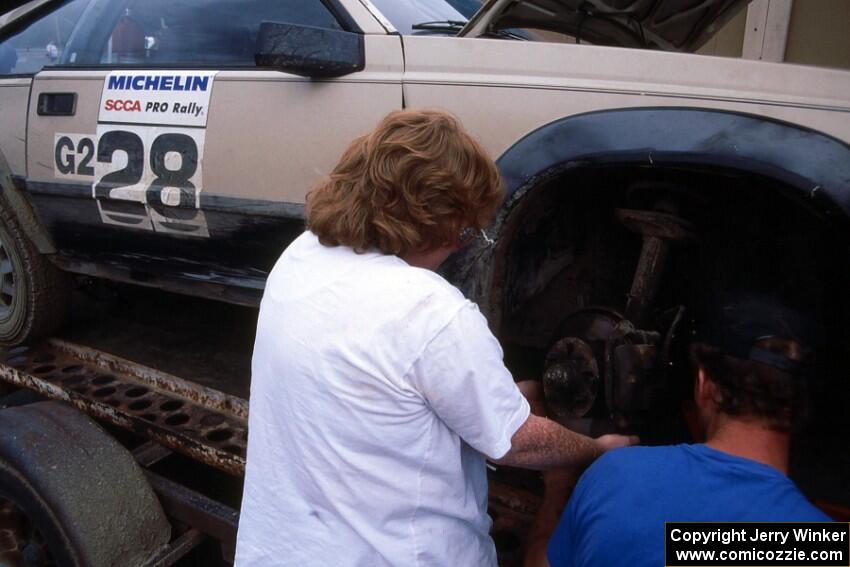 The Dave Konetski / Glenn Koehler Toyota Celica gets work completed just to compete during parc expose.