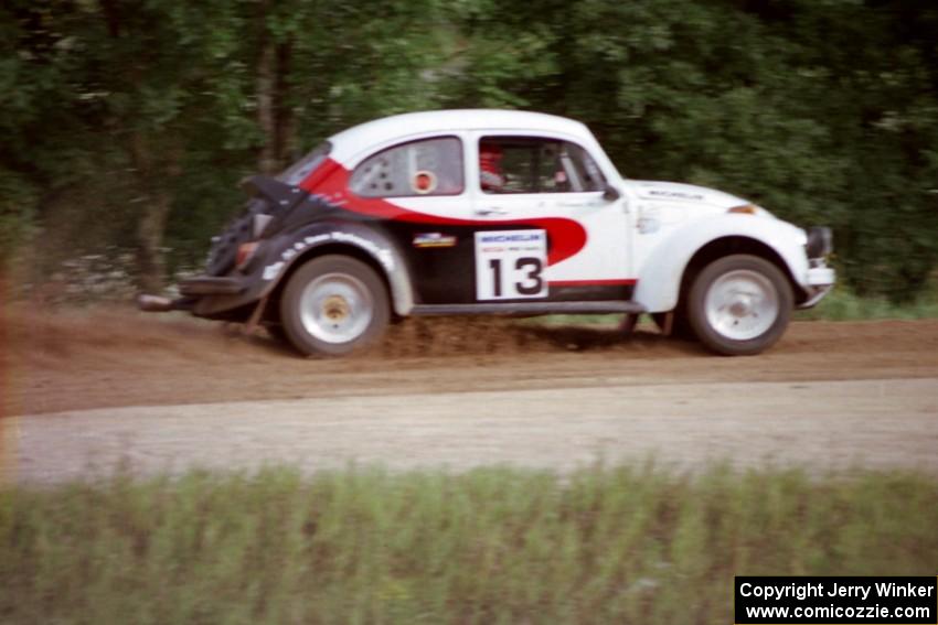 Rene Villemure / Mike Villemure accelerate their VW Beetle away from the spectator point on Indian Creek Trail Rd.