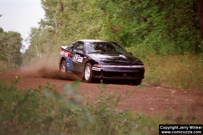 Cal Landau / Eric Marcus in their Mitsubishi Eclipse GSX throw gravel on Indian Creek Trail Rd.