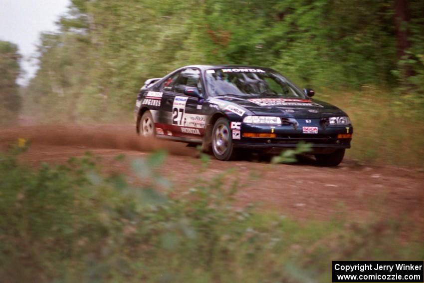 Jim Anderson / Ben Greisler come over a crest on Indian Creek Trail Rd. in their Honda Prelude VTEC.