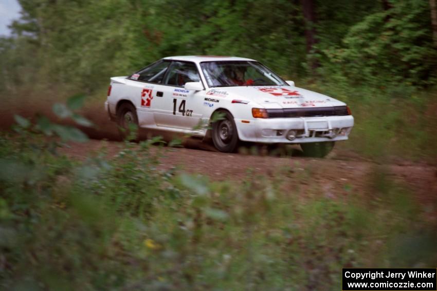 The Janice Damitio / Amity Trowbridge Toyota Celica All-trac at speed down Indian Creek Trail Rd.